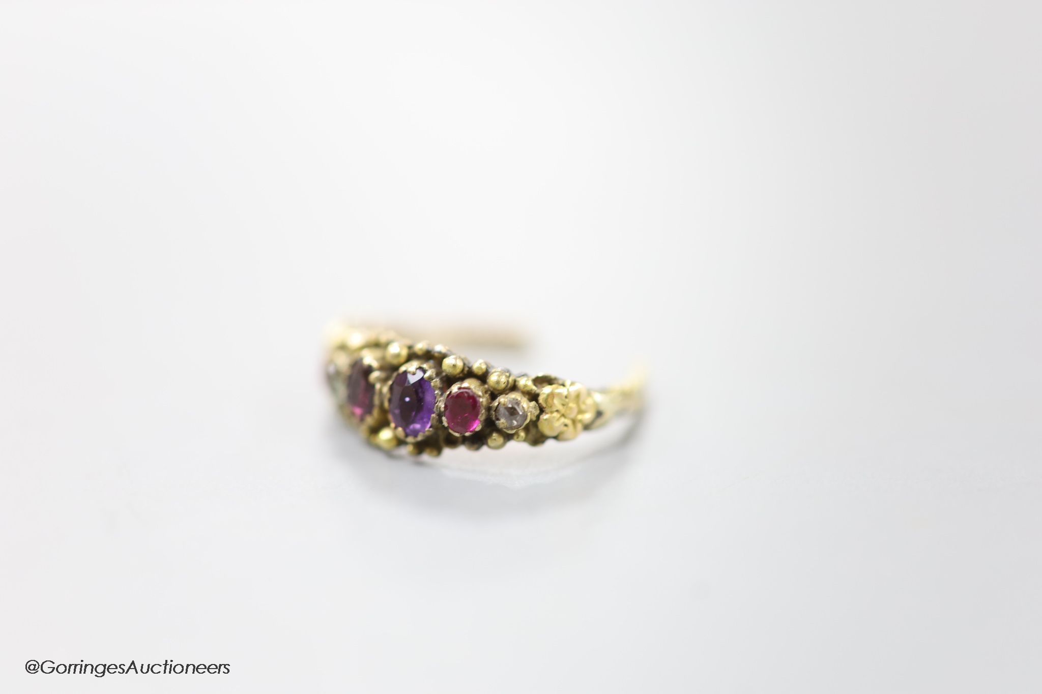 A 19th century and graduated multi gem set 'Regard' ring, (part of shank now missing)